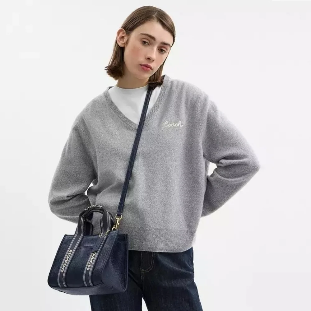 Coach Leather Smith Tote 24 with Striped Handles.